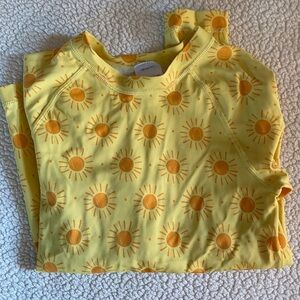 Boys rash guard yellow with suns. Good condition. Hanna Anderson size 8